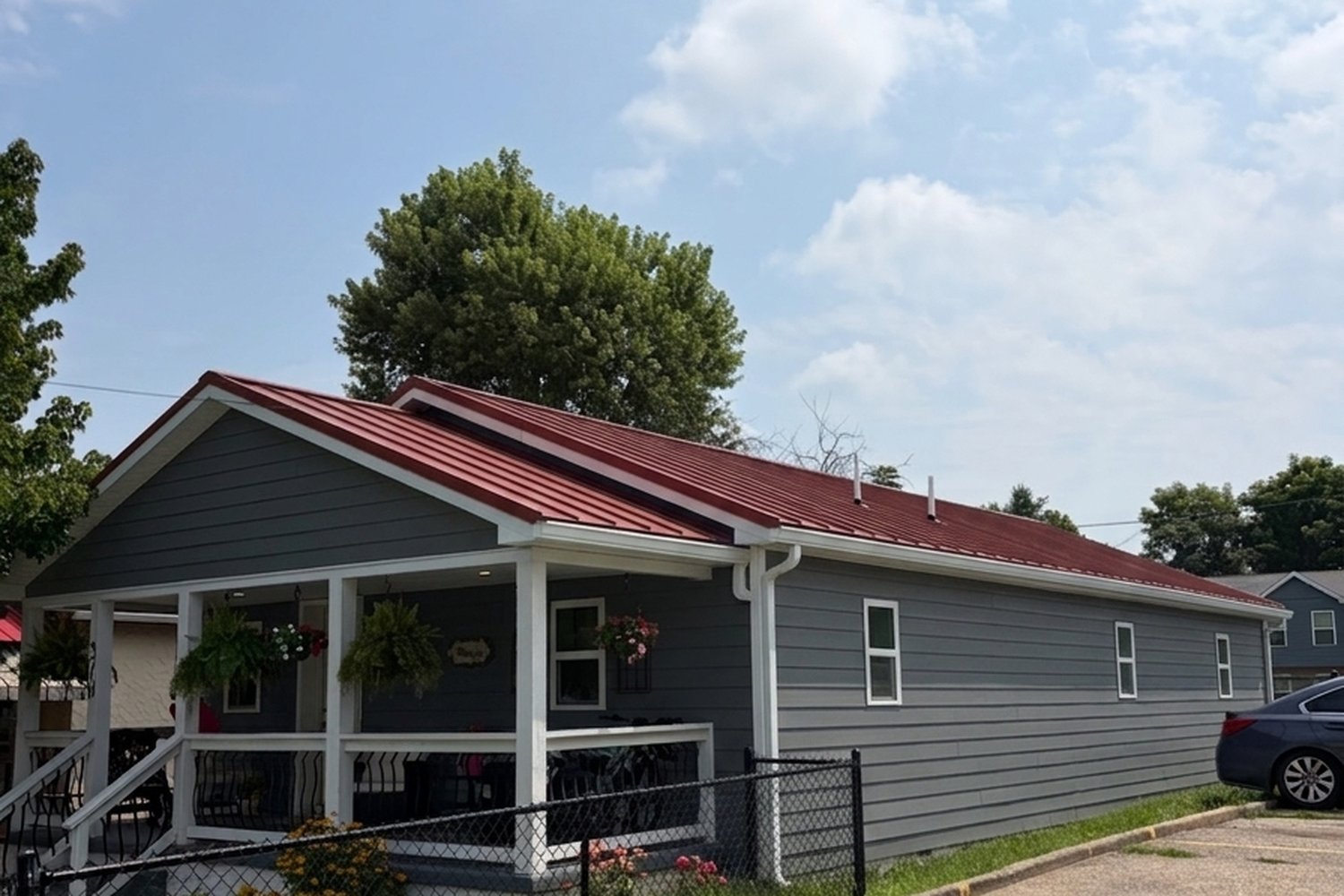 After — new red metal roof